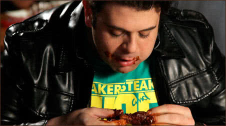 Adam Richman Eating Hot Wings